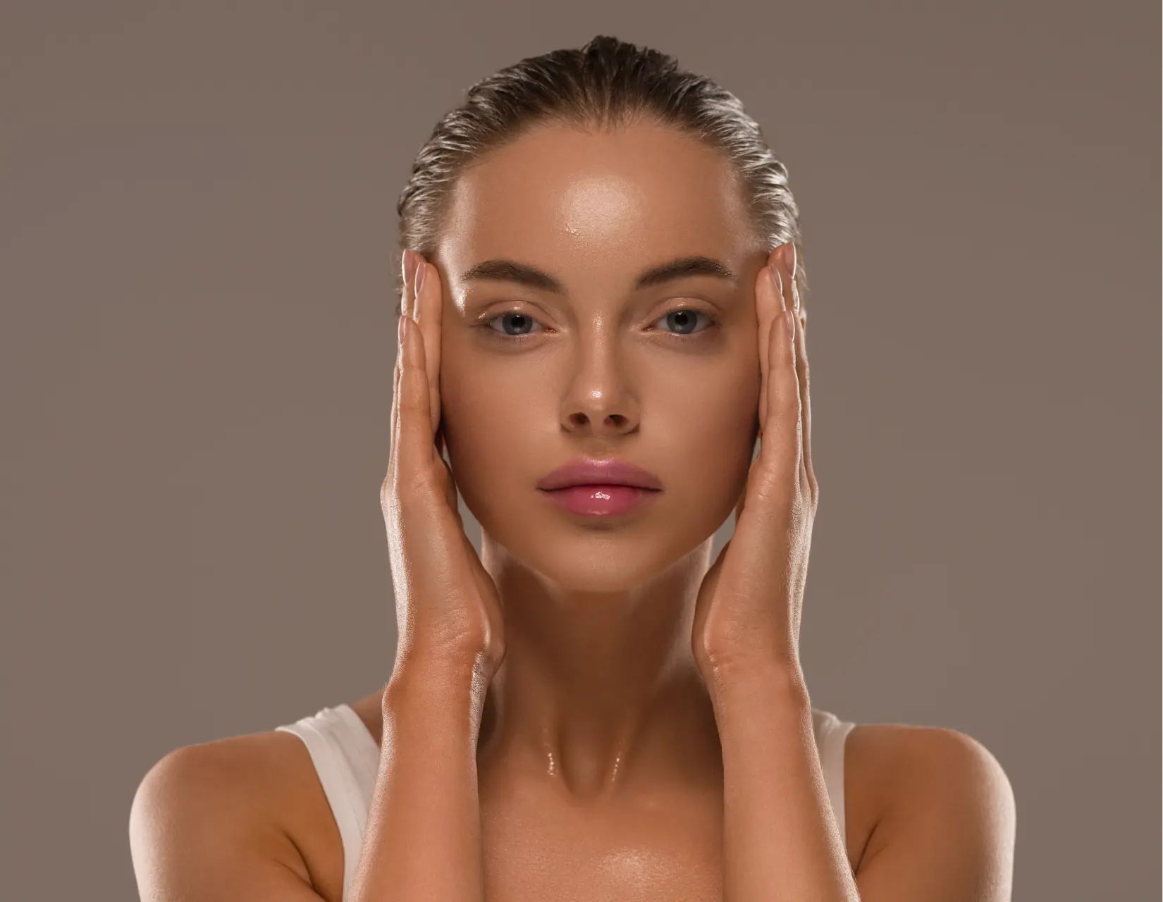 beauty-woman-with-hands-healthy-natural-make-up-clean-fresh-skin-concept-color-background